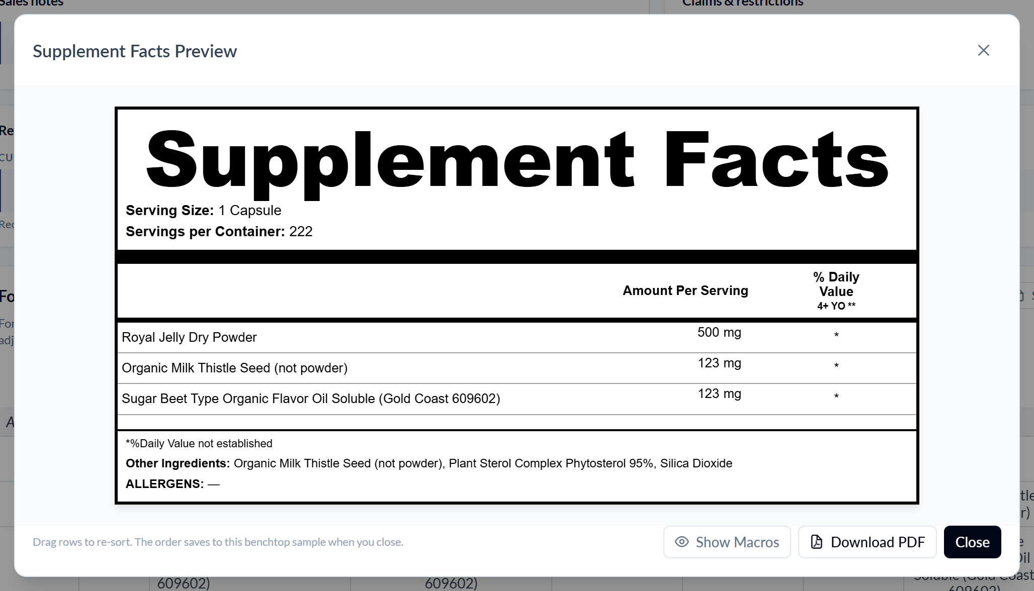 The Supplement Facts Preview dialog over the benchtop page. The label shows Serving Size 1 Capsule and Servings per Container 222, with Amount Per Serving and % Daily Value columns listing Royal Jelly Dry Powder 500 mg, Organic Milk Thistle Seed (not powder) 123 mg and Sugar Beet Type Organic Flavor Oil Soluble (Gold Coast 609602) 123 mg, each with an asterisk. The footer lists Other Ingredients as Organic Milk Thistle Seed (not powder), Plant Sterol Complex Phytosterol 95% and Silica Dioxide. At the bottom a hint reads 'Drag rows to re-sort. The order saves to this benchtop sample when you close.' beside Show Macros, Download PDF and a black Close button.