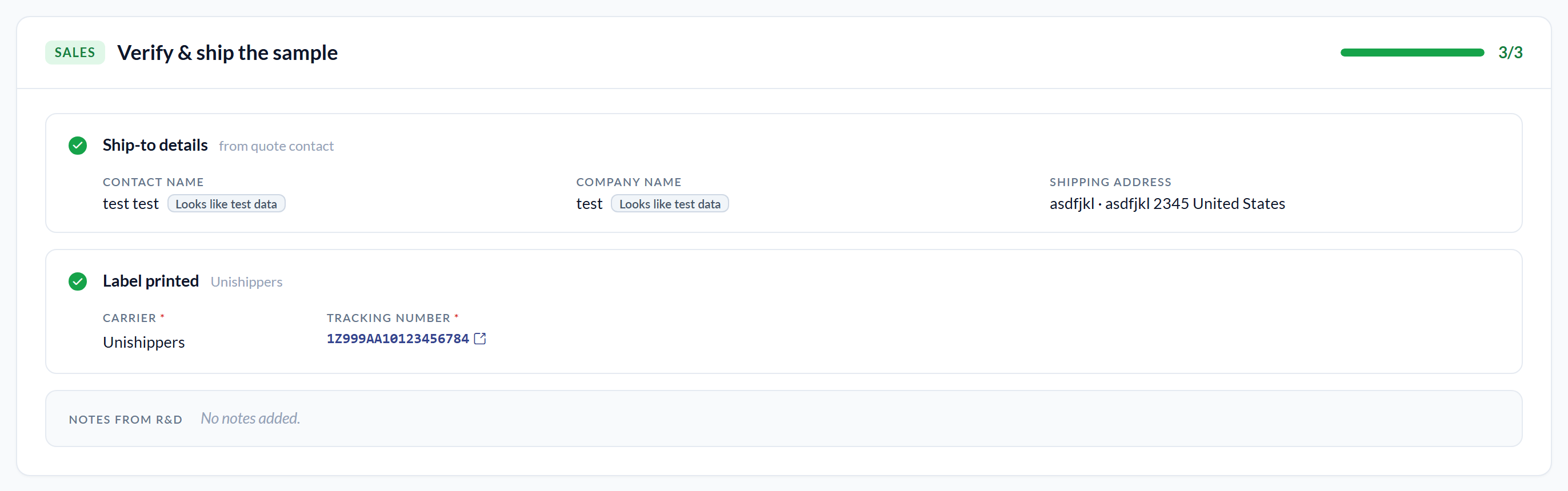 The SALES card titled 'Verify & ship the sample' with a full green progress bar reading 3/3. 'Ship-to details from quote contact' is checked and lists CONTACT NAME 'test test' and COMPANY NAME 'test', each flagged with a 'Looks like test data' chip, plus SHIPPING ADDRESS 'asdfjkl - asdfjkl 2345 United States'. 'Label printed' is checked with Unishippers beside it, showing a required CARRIER of Unishippers and a required TRACKING NUMBER '1Z999AA10123456784' as a link with an external-link icon. A grey footer reads 'NOTES FROM R&D  No notes added.'